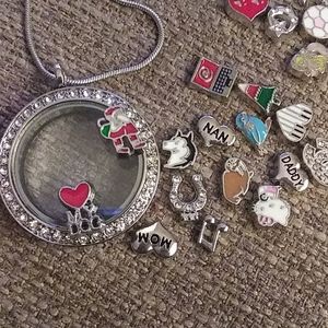 A Locket with Chain and floating Charms